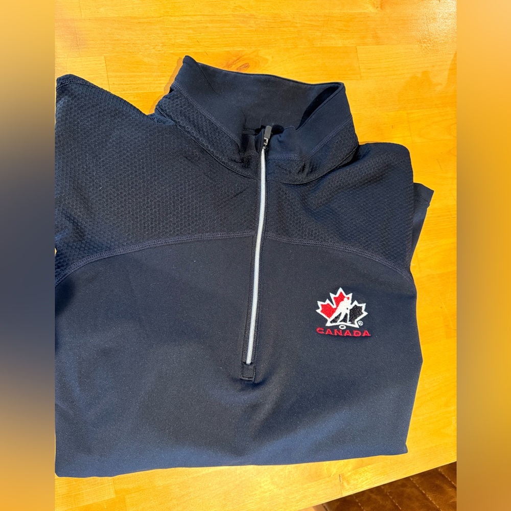 CCM Black and Red Hockey Canada Pullover Brand New. Rarely worn